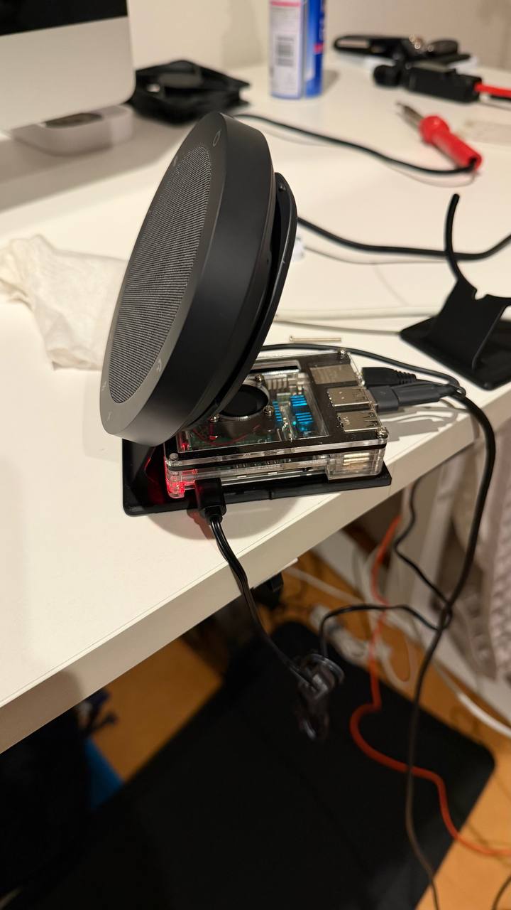 Jarvis voice assistant prototype with a speakerphone and Raspberry Pi